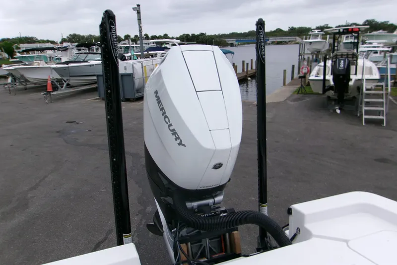 Slide: The Image of 2024 Sportsman Masters 267OE Bay Boat with Mercury engine at marina dock. - 6
