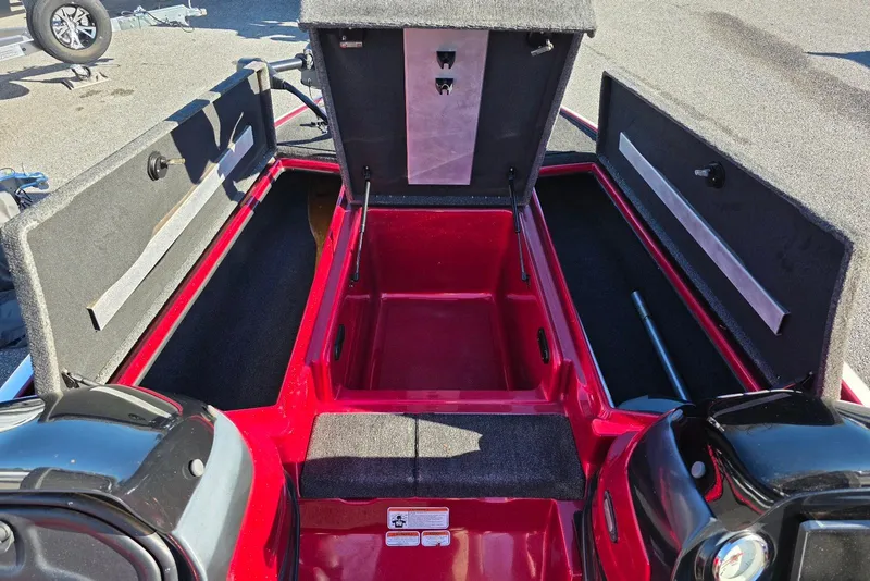 Slide: The Image of 2014 Nitro Z-7 boat storage compartments open, showcasing interior space and design. - 10