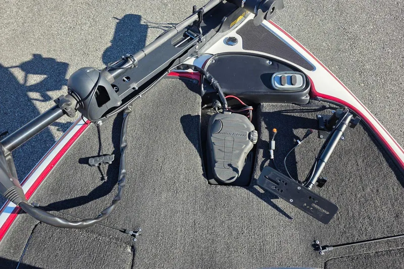 Slide: The Image of 2014 Nitro Z-7 boat deck with trolling motor and foot pedal controls. - 13