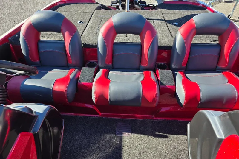 Slide: The Image of Red and gray seats in a 2014 Nitro Z-7 boat interior. - 16