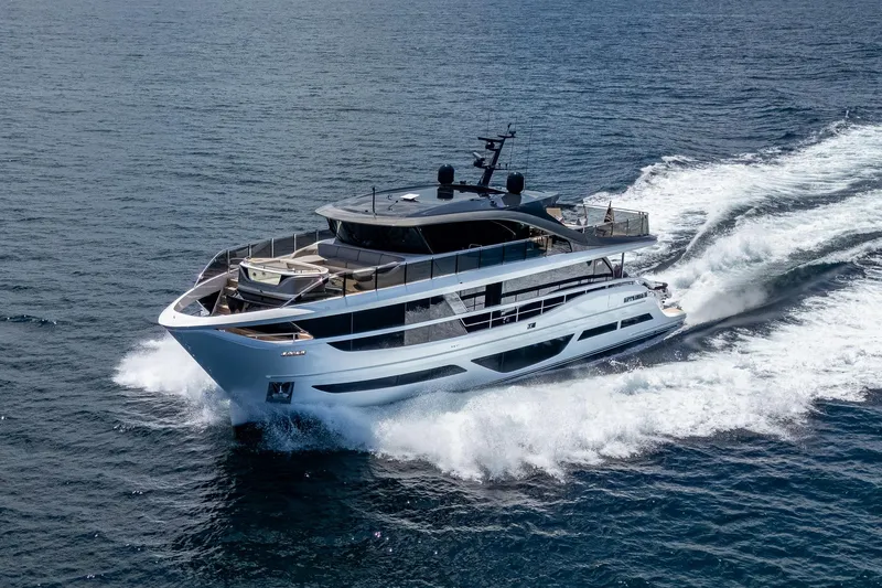 The Image of Luxurious 2022 Princess X95 yacht cruising on open sea, showcasing sleek design and elegance. - 0