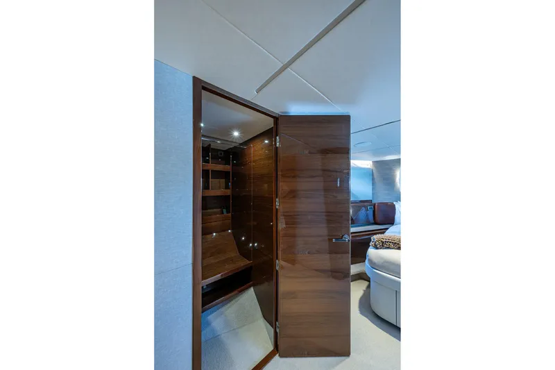 Slide: The Image of Luxurious interior of 2022 Princess X95 yacht with elegant wood finishes and modern design. - 101