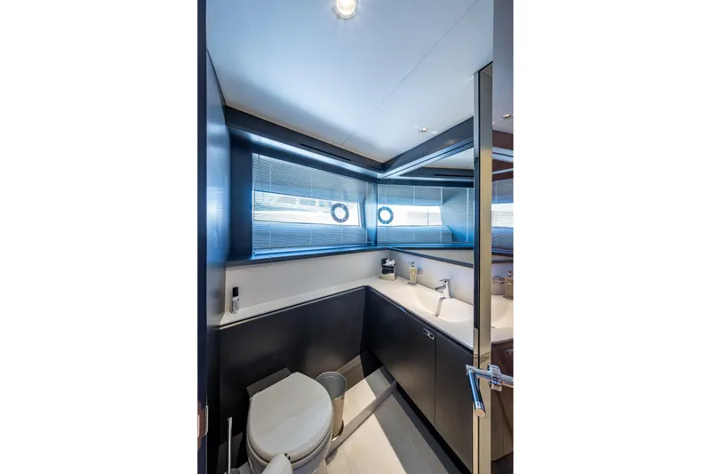 Slide: The Image of Luxurious bathroom in 2022 Princess X95 yacht with modern fixtures and sleek design. - 104