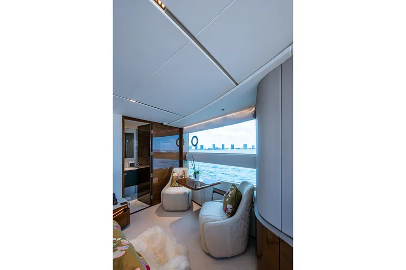 Slide: The Image of Luxurious interior of 2022 Princess X95 yacht with ocean view and elegant seating. - 112