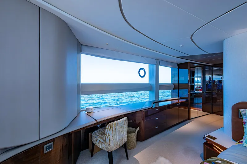 Slide: The Image of Luxurious interior of 2022 Princess X95 yacht with ocean view through large windows. - 117