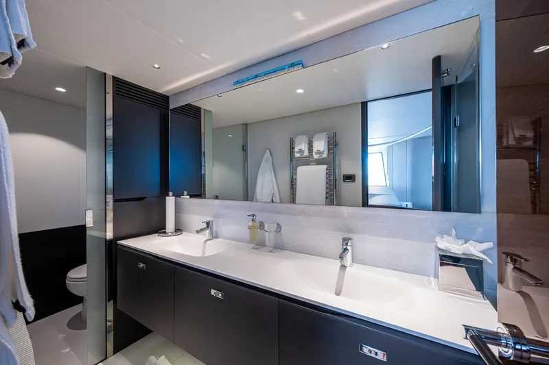 Slide: The Image of Luxurious bathroom in 2022 Princess X95 yacht with double sinks and modern fixtures. - 121