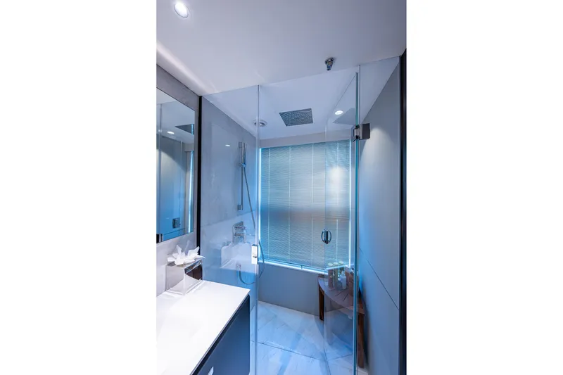 Slide: The Image of Luxurious bathroom in 2022 Princess X95 yacht with glass shower and modern fixtures. - 126