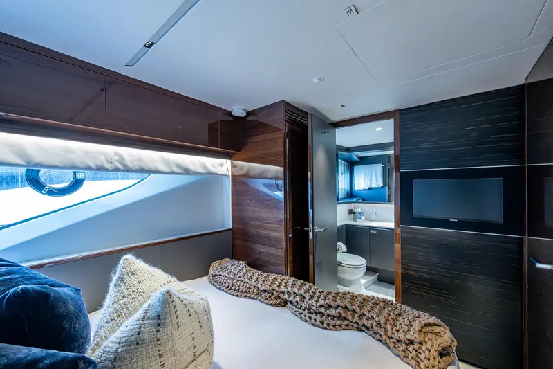 Slide: The Image of Luxurious interior of 2022 Princess X95 yacht cabin with modern design and ensuite bathroom. - 132