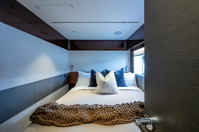 Slide: The Image of Luxurious bedroom interior of 2022 Princess X95 yacht with cozy bedding and modern design. - 133