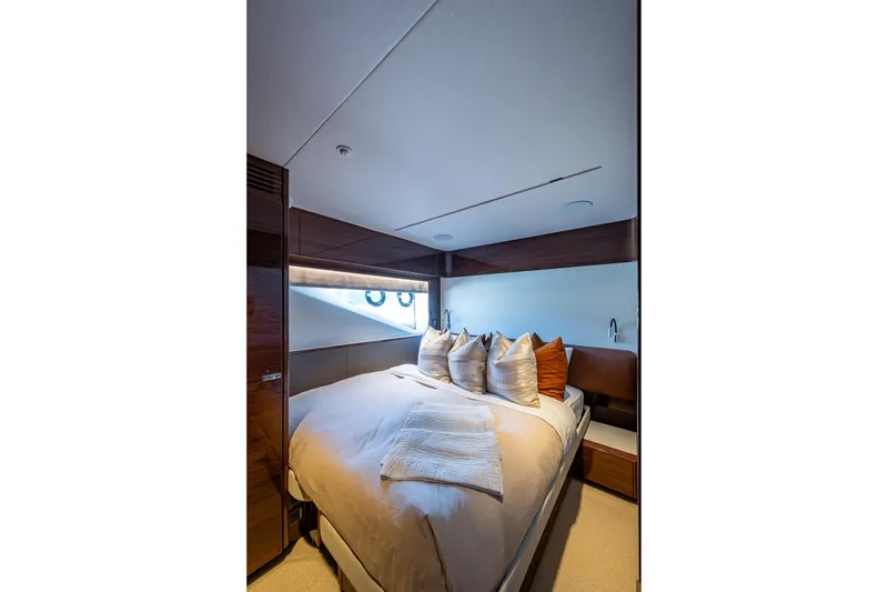 Slide: The Image of Luxurious bedroom interior of 2022 Princess X95 yacht with elegant bedding and modern design. - 141