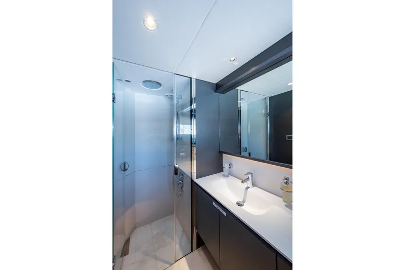 Slide: The Image of Luxurious bathroom on 2022 Princess X95 yacht with modern fixtures and glass shower. - 147