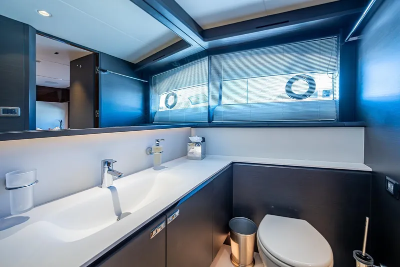 Slide: The Image of Luxurious bathroom in 2022 Princess X95 yacht, featuring modern fixtures and sleek design. - 149