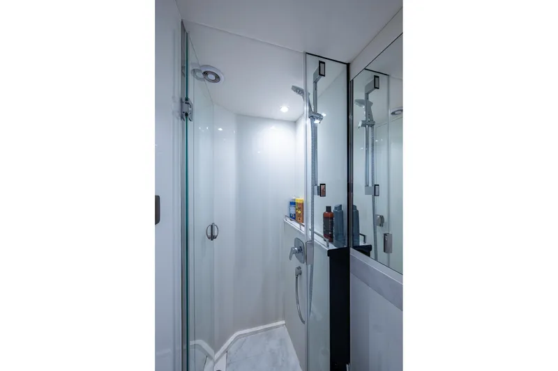 Slide: The Image of Luxurious shower area in 2022 Princess X95 yacht, featuring sleek glass doors and modern fixtures. - 153
