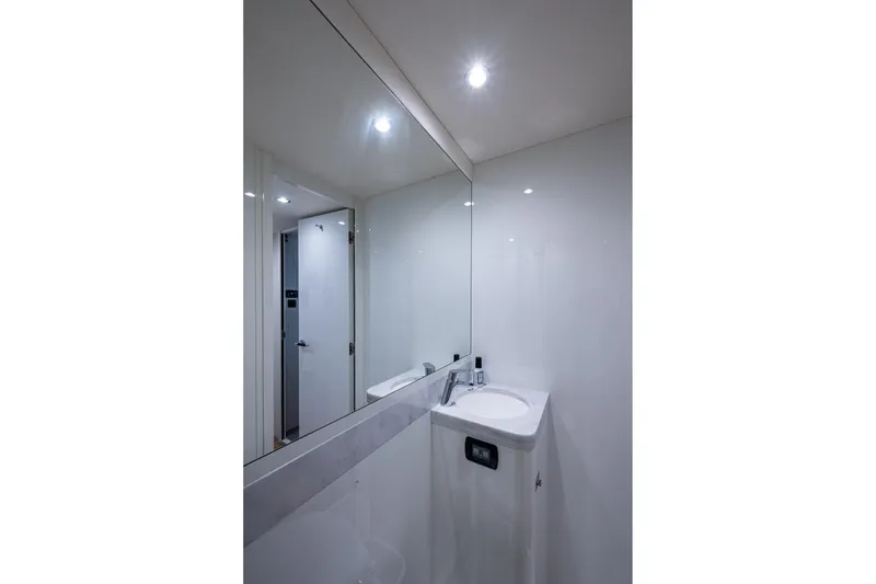 Slide: The Image of Modern bathroom interior on 2022 Princess X95 yacht, featuring sleek design and lighting. - 154