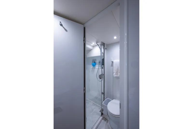 Slide: The Image of Luxurious bathroom in 2022 Princess X95 yacht, featuring modern shower and toilet. - 156