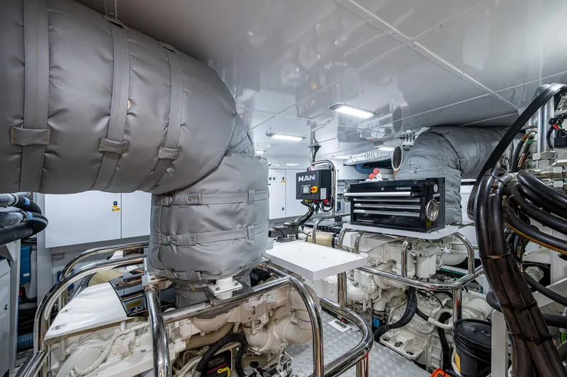 Slide: The Image of Engine room of 2022 Princess X95 yacht with advanced machinery and equipment. - 160