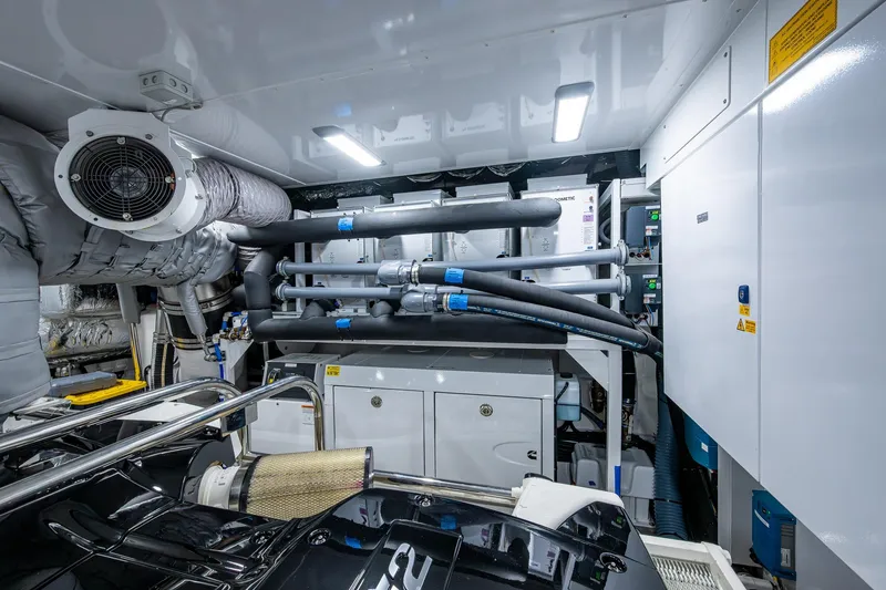 Slide: The Image of Engine room of 2022 Princess X95 yacht, showcasing advanced mechanical systems and equipment. - 164