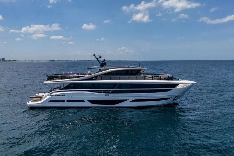 Slide: The Image of Luxury 2022 Princess X95 yacht cruising on open sea under clear skies. - 3