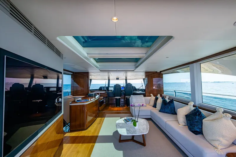 Slide: The Image of Luxurious interior of 2022 Princess X95 yacht with panoramic windows and elegant seating. - 39