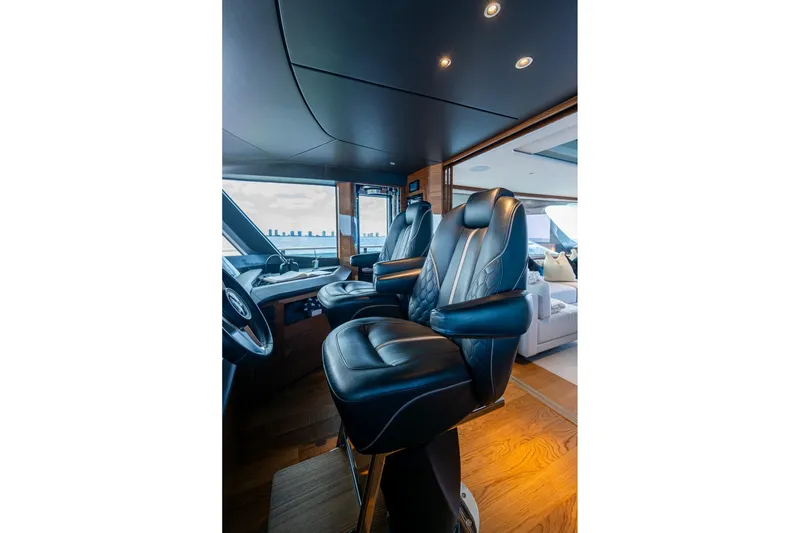 Slide: The Image of Luxurious interior of 2022 Princess X95 yacht with plush leather seating. - 49