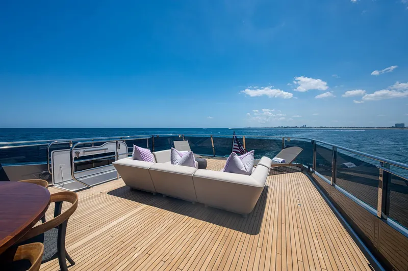 Slide: The Image of Luxurious 2022 Princess X95 yacht deck with ocean view and elegant seating. - 56