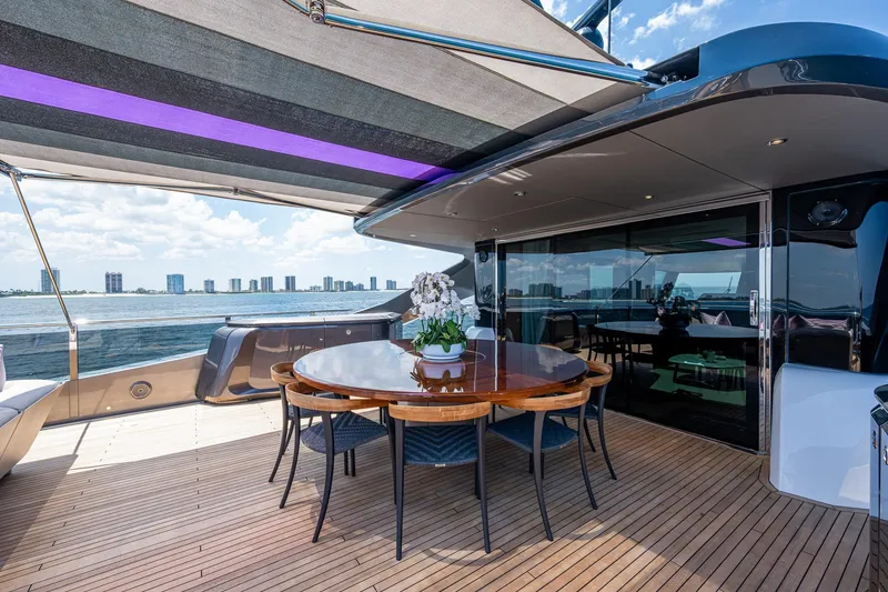 Slide: The Image of Luxurious 2022 Princess X95 yacht deck with elegant dining area and ocean view. - 70