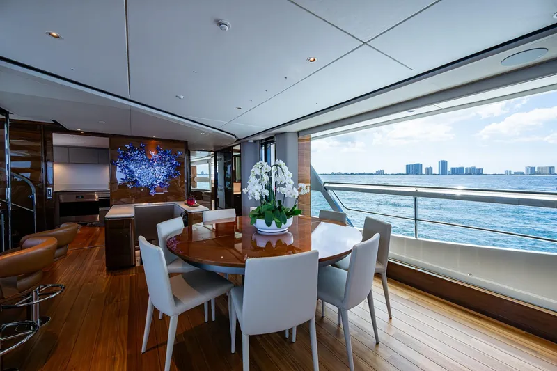 Slide: The Image of Luxurious interior of 2022 Princess X95 yacht with ocean view and elegant dining area. - 89