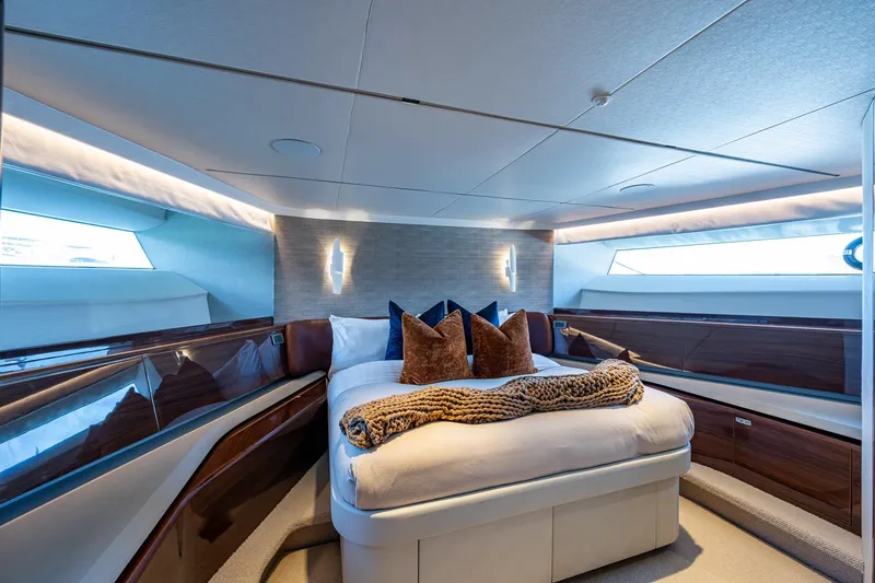 Slide: The Image of Luxurious 2022 Princess X95 yacht bedroom with modern design and elegant lighting. - 94