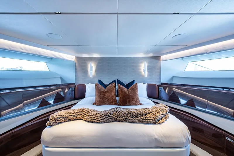 Slide: The Image of Luxurious bedroom interior of 2022 Princess X95 yacht with elegant decor and plush bedding. - 96