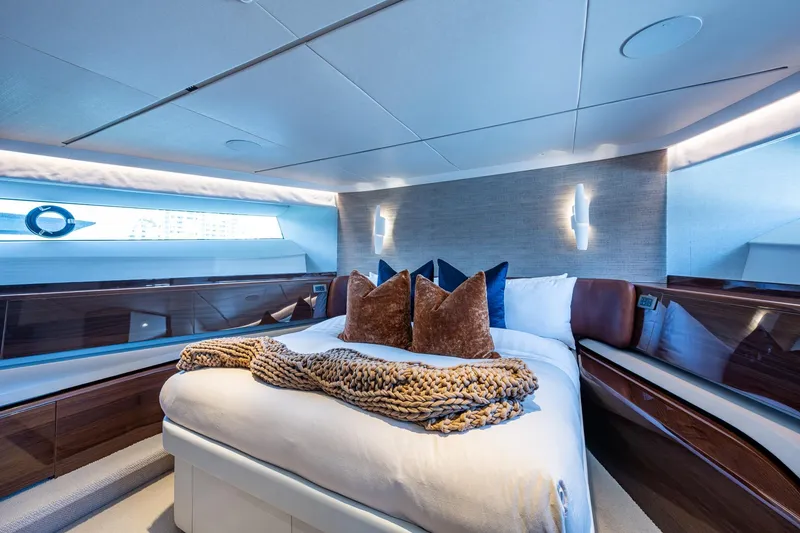 Slide: The Image of Luxurious bedroom interior of 2022 Princess X95 yacht with elegant decor and modern lighting. - 99