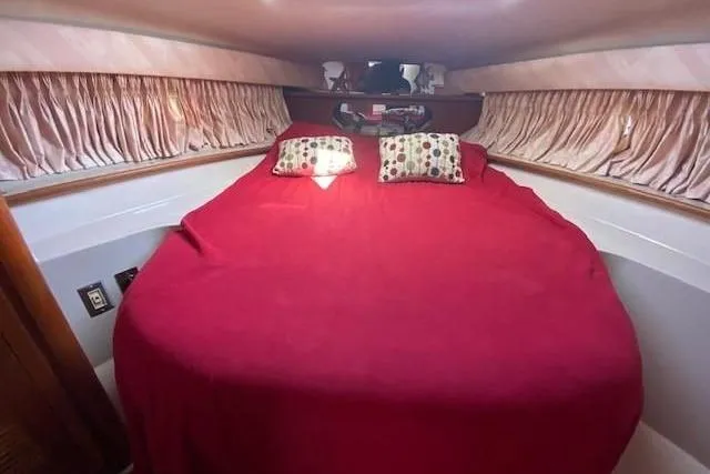 Slide: The Image of 1992 Regal Commodore 400 boat interior with white dashboard and steering wheel. - 4