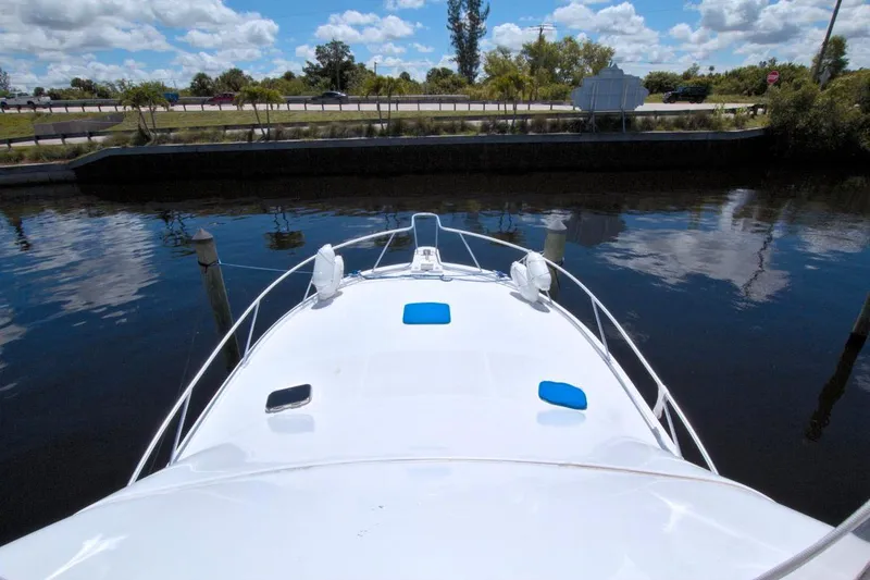Slide: The Image of 1998 Luhrs 36 Convertible yacht cruising on a sunny day. - 20