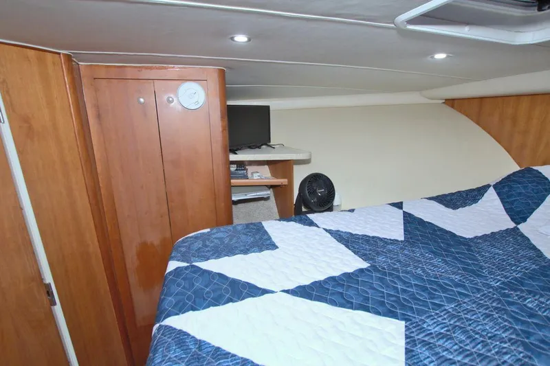 Slide: The Image of Interior storage area of 1998 Luhrs 36 Convertible boat with cleaning supplies. - 39