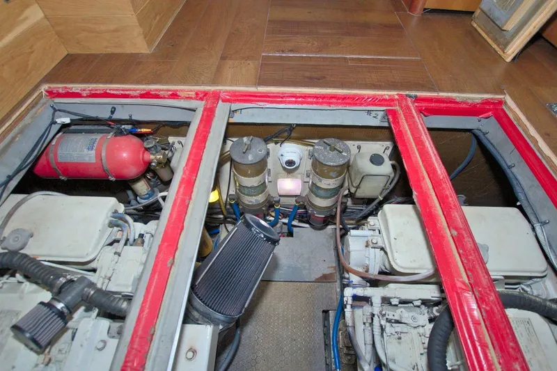 Slide: The Image of Interior of 1998 Luhrs 36 Convertible boat with wooden cabinetry and bed. - 48