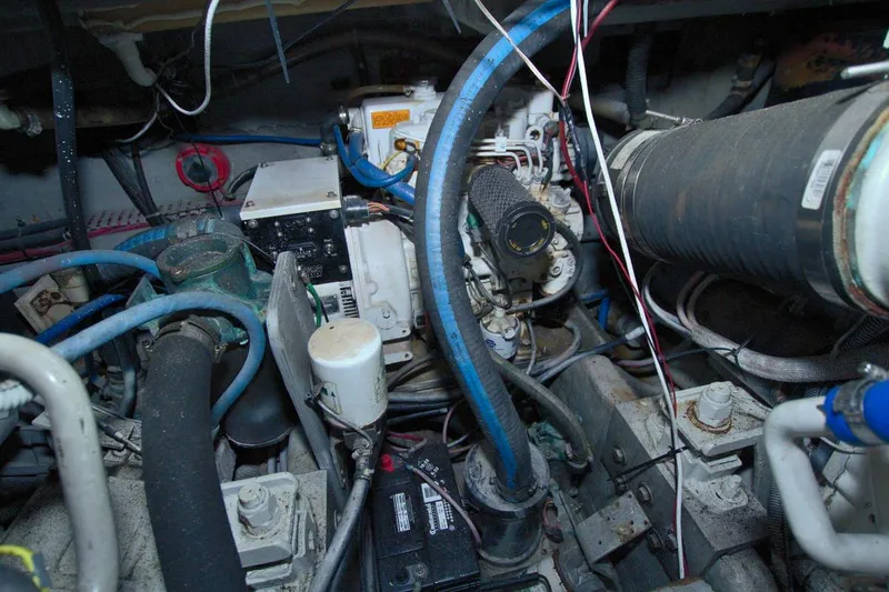 Slide: The Image of 1998 Luhrs 36 Convertible boat interior with water system and storage bins. - 53