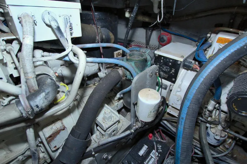 Slide: The Image of 1998 Luhrs 36 Convertible interior with wooden flooring and modern appliances. - 55