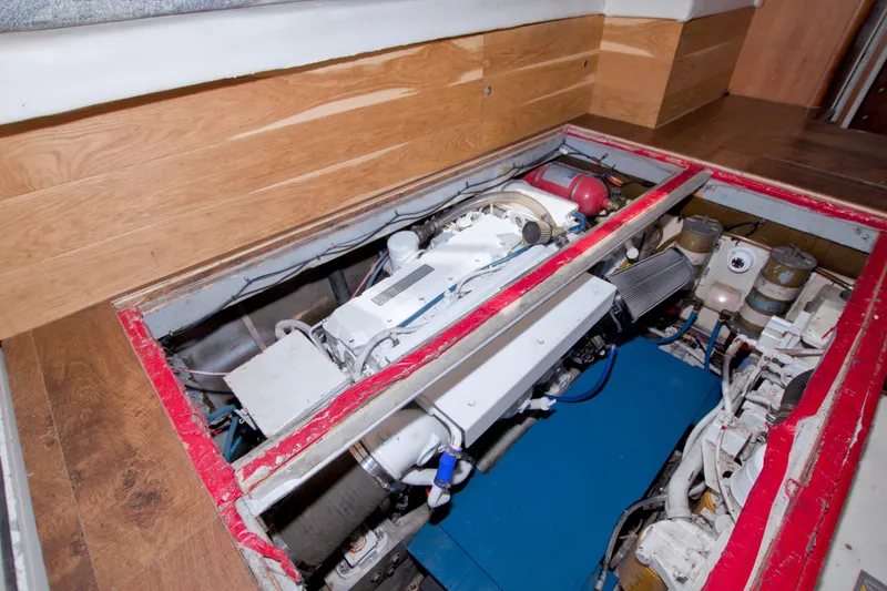 Slide: The Image of Engine compartment of 1998 Luhrs 36 Convertible boat, showcasing mechanical components. - 70