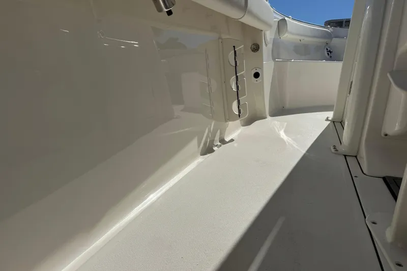 Slide: The Image of 2026 Key West 244 Center Console boat interior, showcasing sleek design and spacious layout. - 18