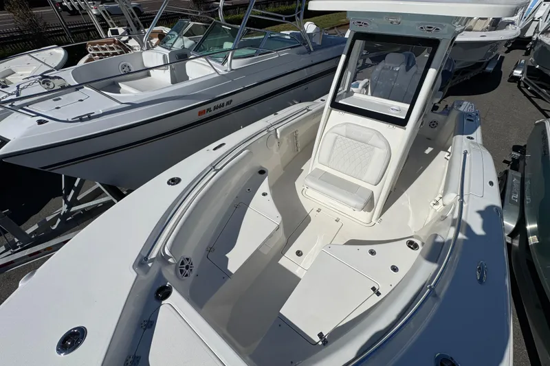 Slide: The Image of 2026 Key West 244 Center Console boat with spacious seating and modern design. - 27