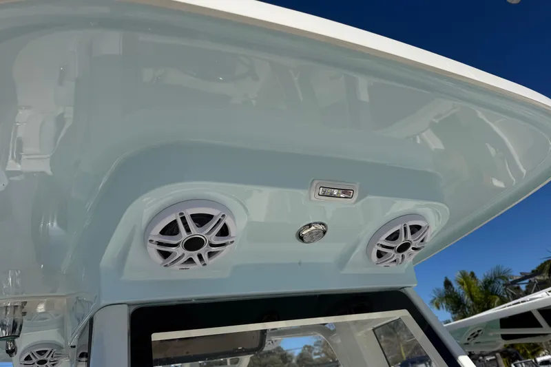 Slide: The Image of 2026 Key West 244 Center Console boat speakers and lighting detail. - 29