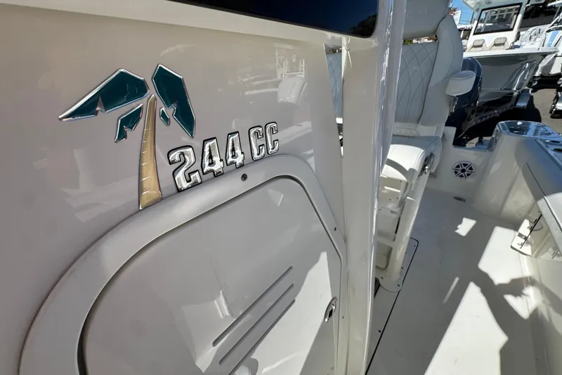Slide: The Image of 2026 Key West 244 Center Console boat interior with logo detail. - 34