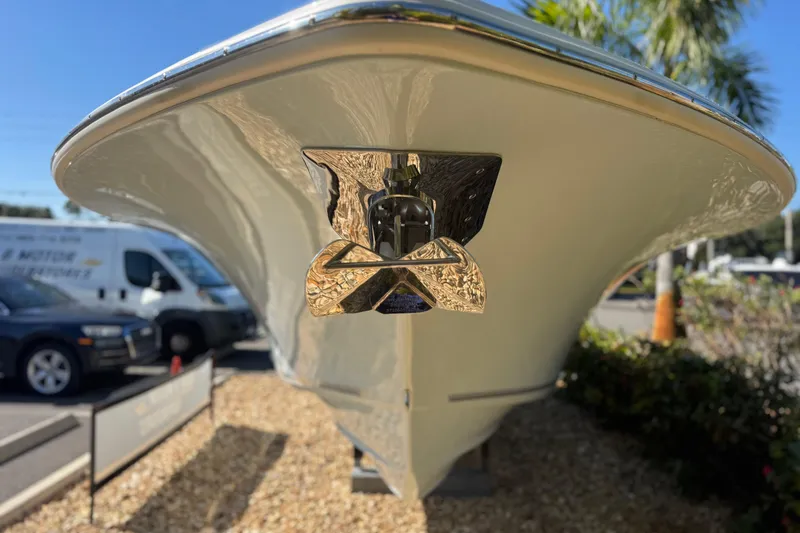 Slide: The Image of 2026 Key West 244 Center Console boat bow with anchor, parked outdoors. - 4