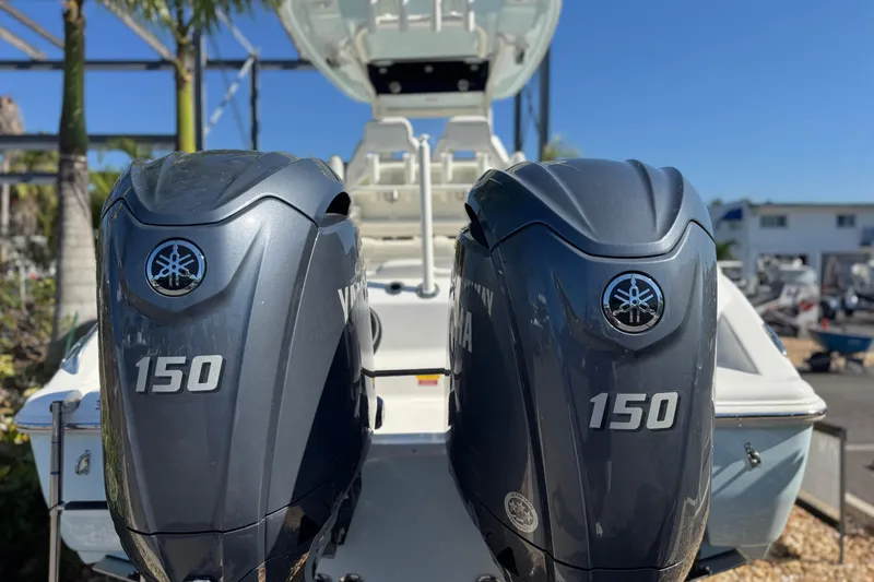 Slide: The Image of 2026 Key West 244 Center Console with dual Yamaha 150 outboard engines. - 7