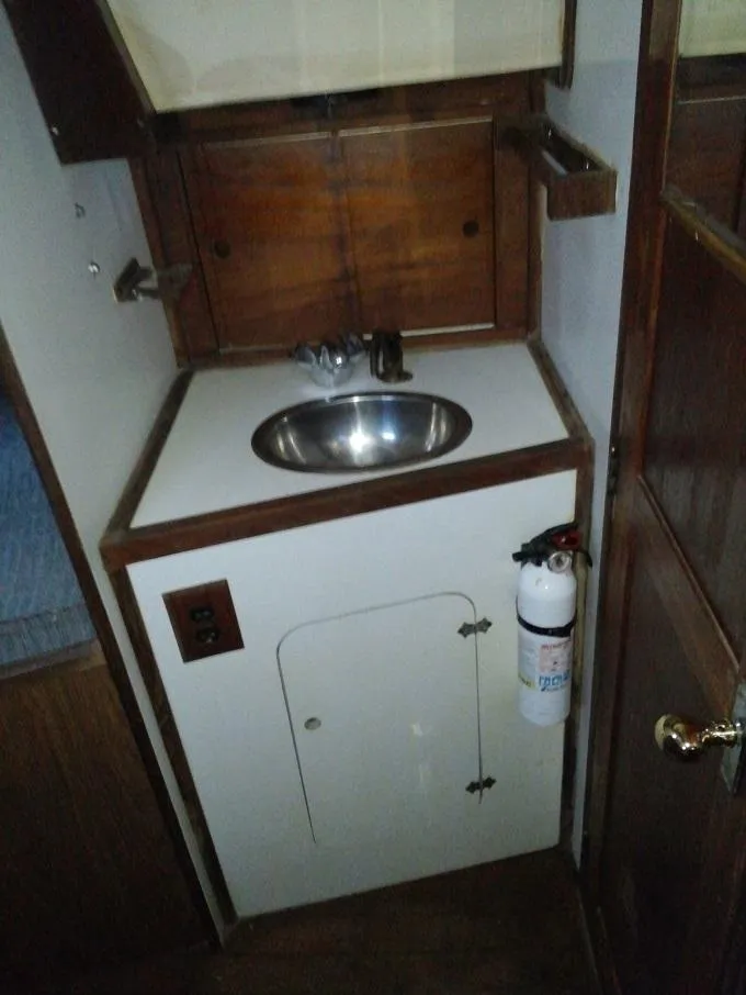 Slide: The Image of Compact sink in a 1973 Allied Mistress yacht. - 11