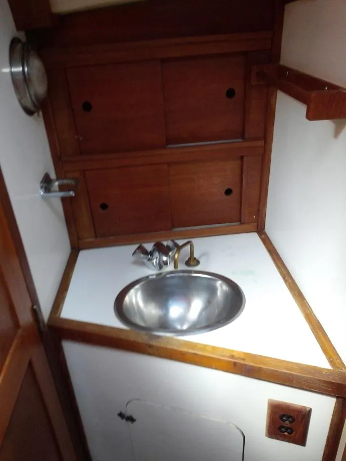 Slide: The Image of Compact boat galley with stainless steel sink, Allied Mistress 1973. - 12