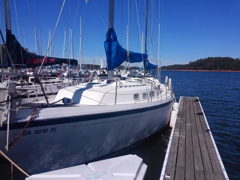 Slide: The Image of 1973 Allied Mistress sailboat docked in marina. - 15