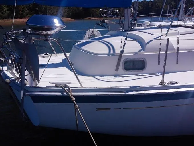 Slide: The Image of 1973 Allied Mistress sailboat on water, side view. - 19