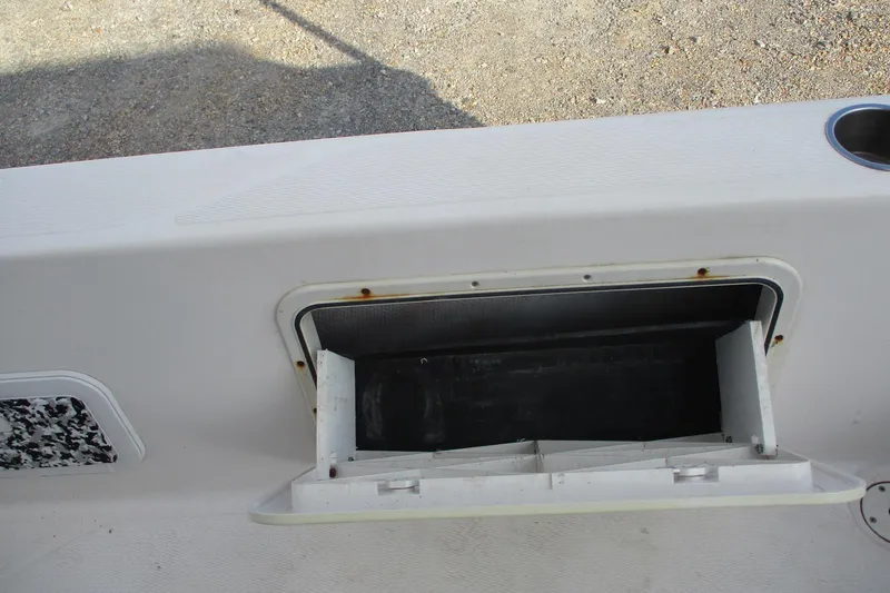 Slide: The Image of Open storage compartment on a 2019 Blue Wave 2200 SL BAY boat. - 17