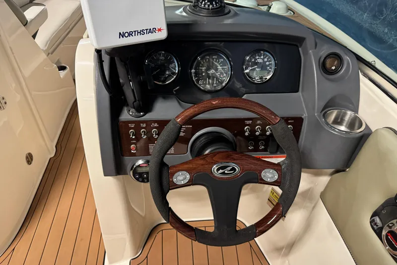 Slide: The Image of Steering console of 2007 Sea Ray 260 Sundeck with Northstar navigation system. - 13