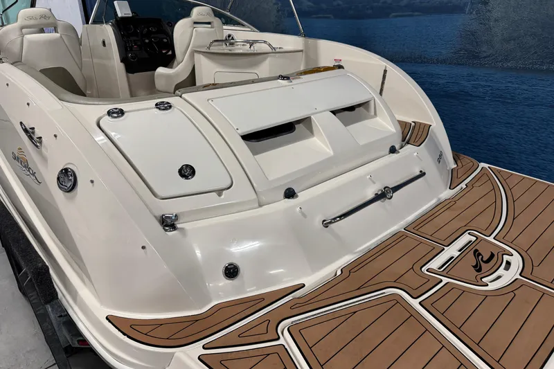 Slide: The Image of 2007 Sea Ray 260 Sundeck boat with spacious deck and elegant seating. - 5